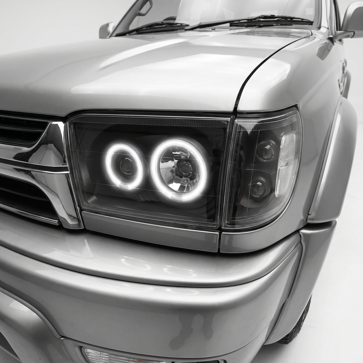 Toyota Hilux Surf / 4 Runner N180 (1995 - 2002) Angel Eyes Headlights LH + RH installed close-up