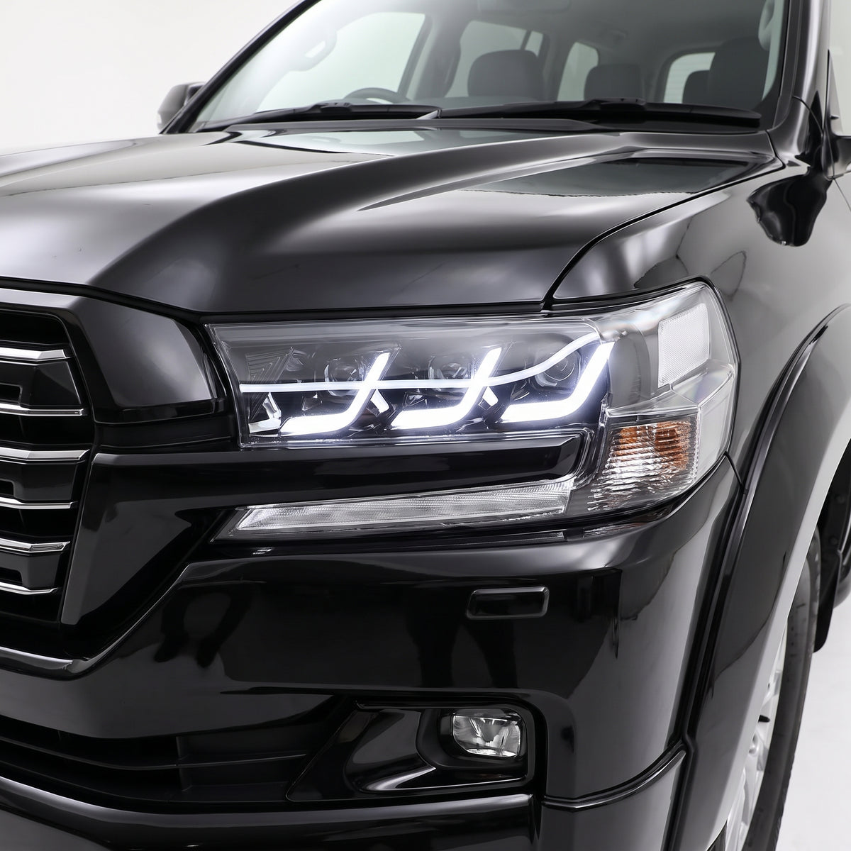 Toyota LandCruiser 200 Series (2016 - 2021) LED DRL Triple Lens Headlights LH + RH installed