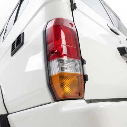 Toyota LandCruiser 70 Series (1985 - 1999) OEM Style Tail Lights LH + RH installed close-up