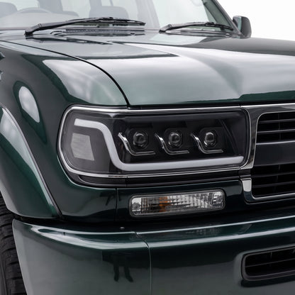Toyota LandCruiser 80 Series (1990 - 1997) Sequential LED DRL Black Projector Headlights LH + RH