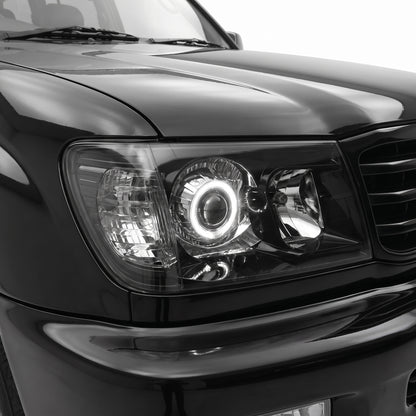 Toyota LandCruiser FJ100 Pre-Facelift (1998 - 2005) Black LED Angel Eye Halo Projector Headlights LH + RH installed close-up