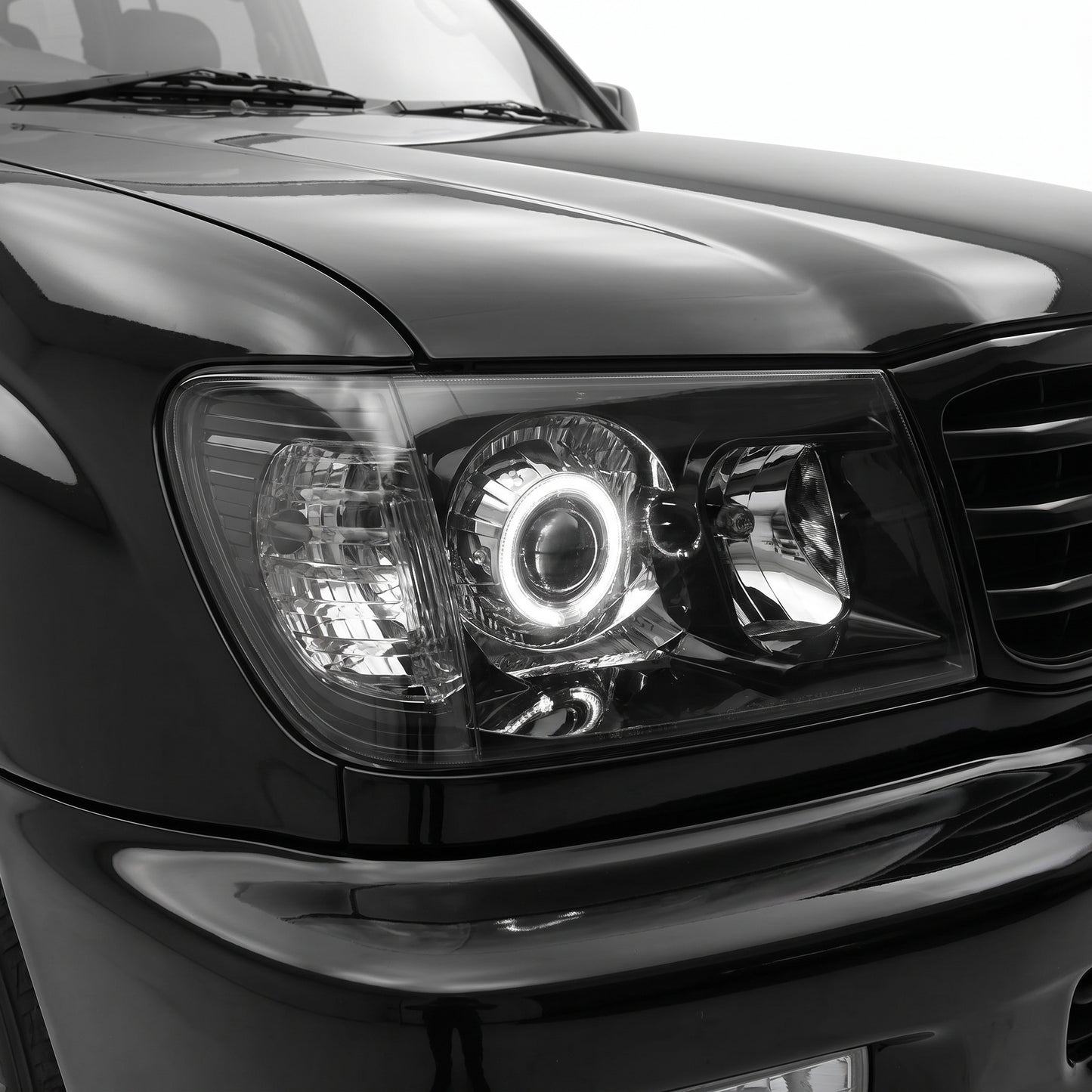 Toyota LandCruiser FJ100 Pre-Facelift (1998 - 2005) Black LED Angel Eye Halo Projector Headlights LH + RH