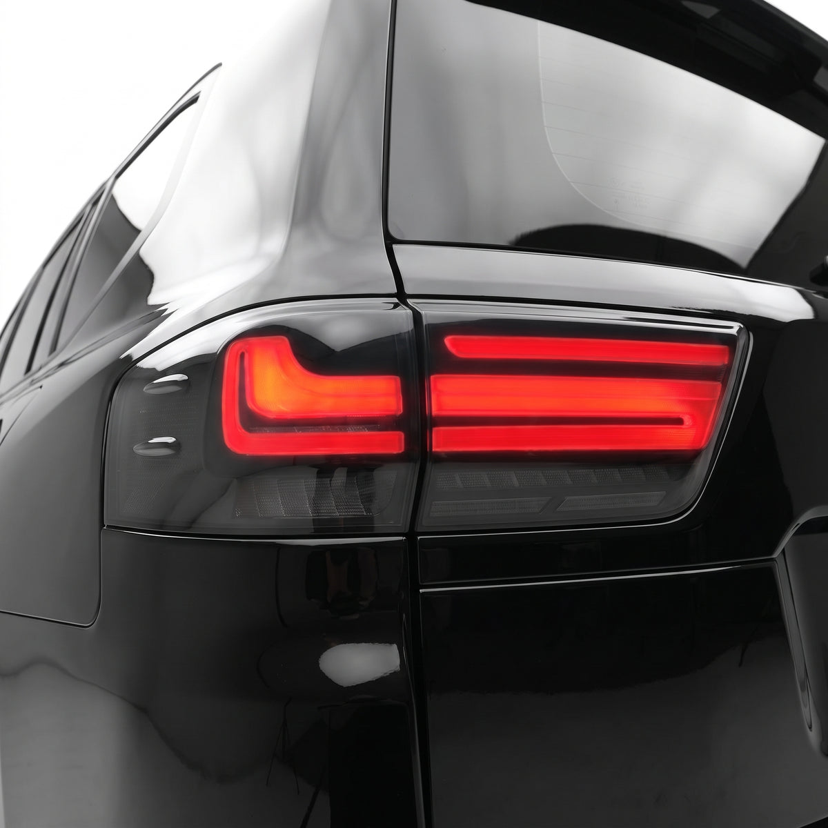 Toyota LandCruiser LC300 (2021 - 2025) Sequential Smoked Full LED Inner and Outer Tail Lights LH + RH installed close-up