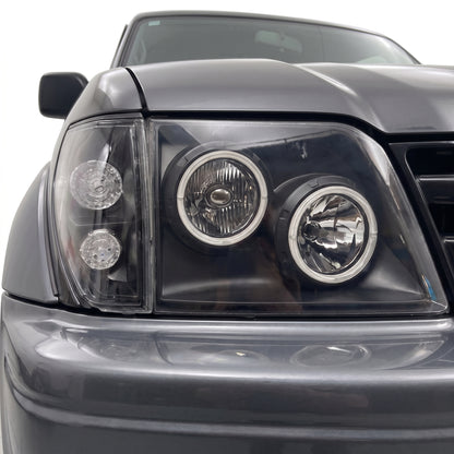 Toyota LandCruiser Prado 90 / 95 Series (1997 - 2002) Black Halo Angel Eyes Headlights LH + RH installed close-up
