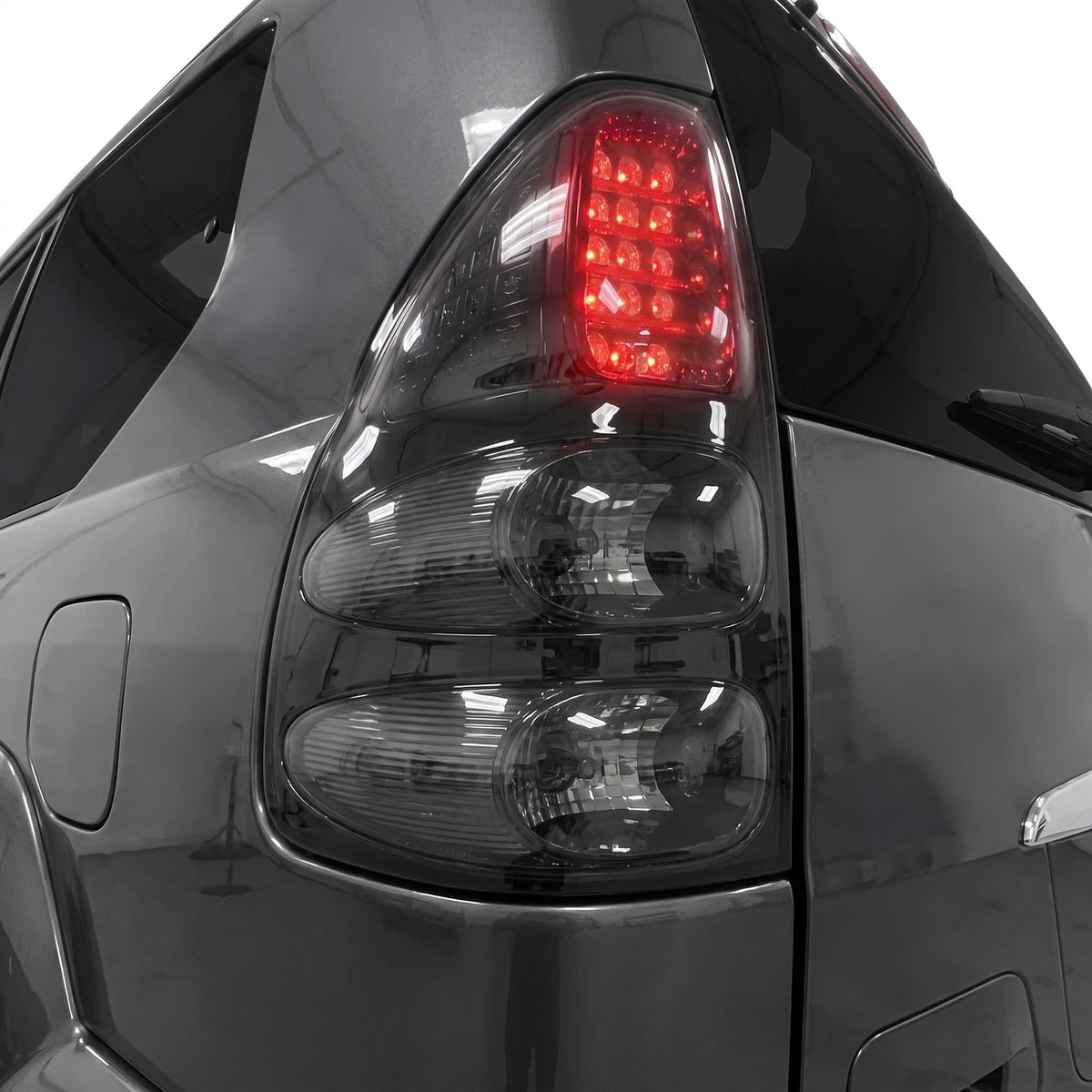 Toyota LandCruiser Prado FJ120 / LC120 Series (2003 - 2009) Smoked Black LED Tail Lights LH + RH installed close-up