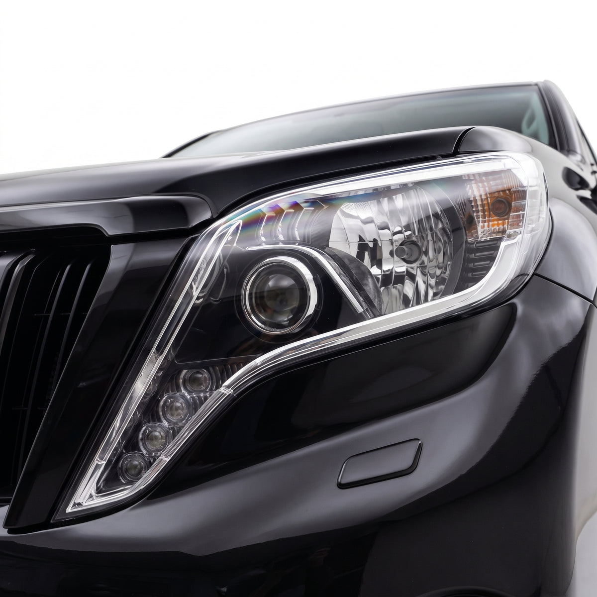 Toyota LandCruiser Prado GRJ150 / KDJ150 Series 2 (2013 - 2017) Black LED DRL Headlights LH + RH installed close-up