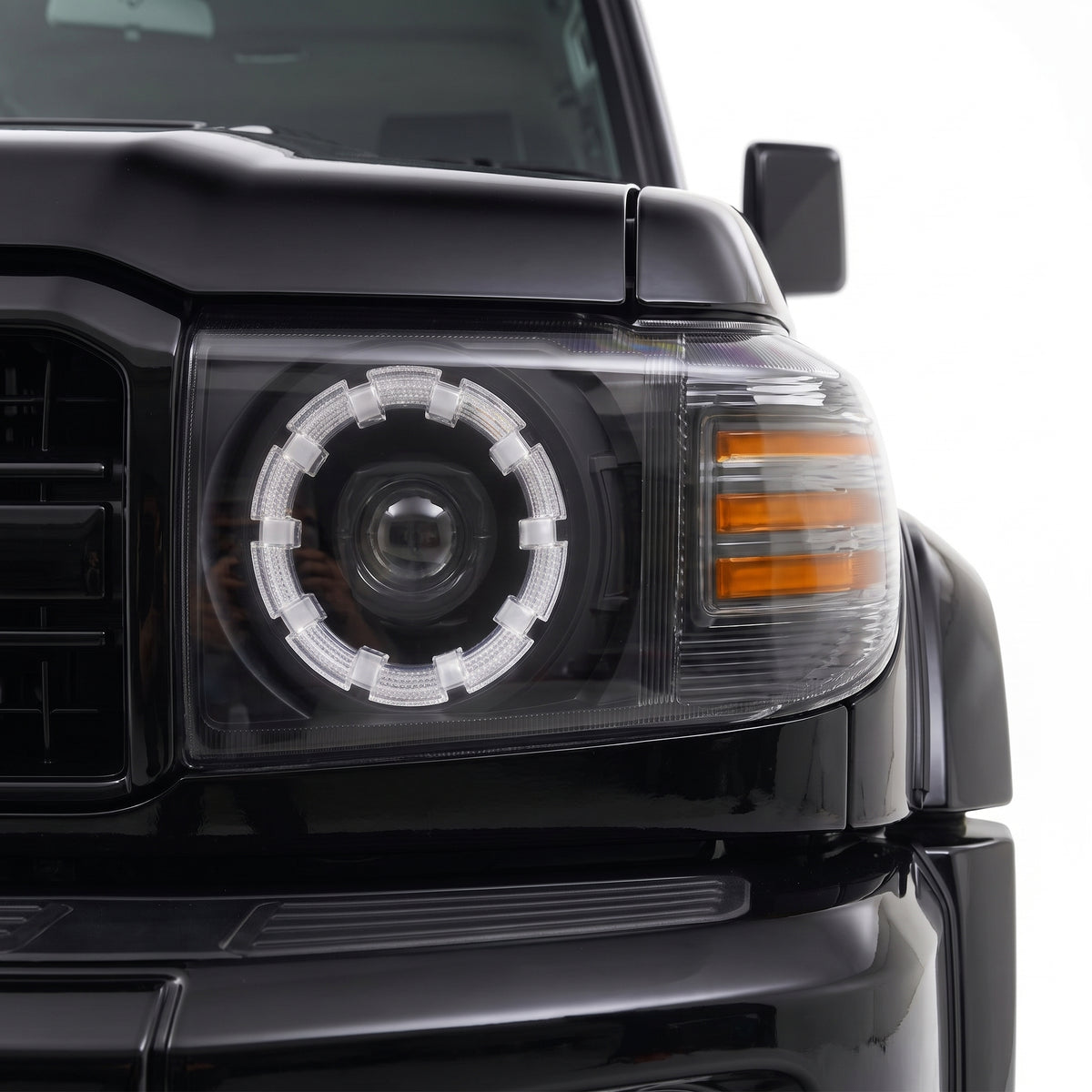 Toyota LandCruiser VDJ70 / 76 / 78 / 79 Series (2007 - 2025) Smoked LED Headlights LH + RH installed close-up