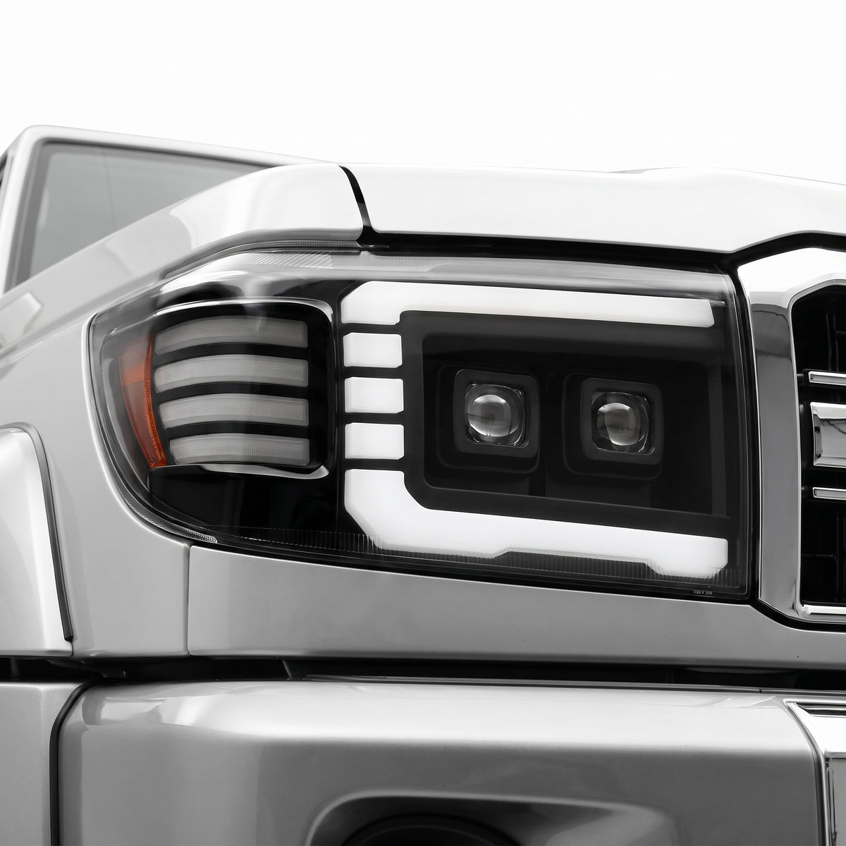 Toyota LandCruiser VDJ 70 / 76 / 78 / 79 Series (2007 - 2023) C Style DRL LED Headlights LH + RH installed close-up