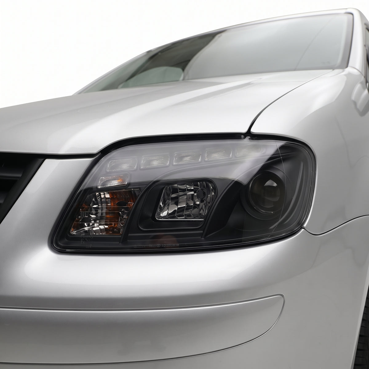 Volkswagen Caddy 2K (2006 - 2010) LED DRL Projector Headlights LH + RH installed close-up