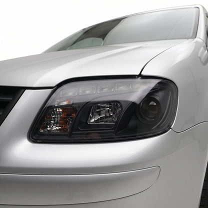 Volkswagen Caddy 2K (2006 - 2010) LED DRL Projector Headlights LH + RH installed close-up
