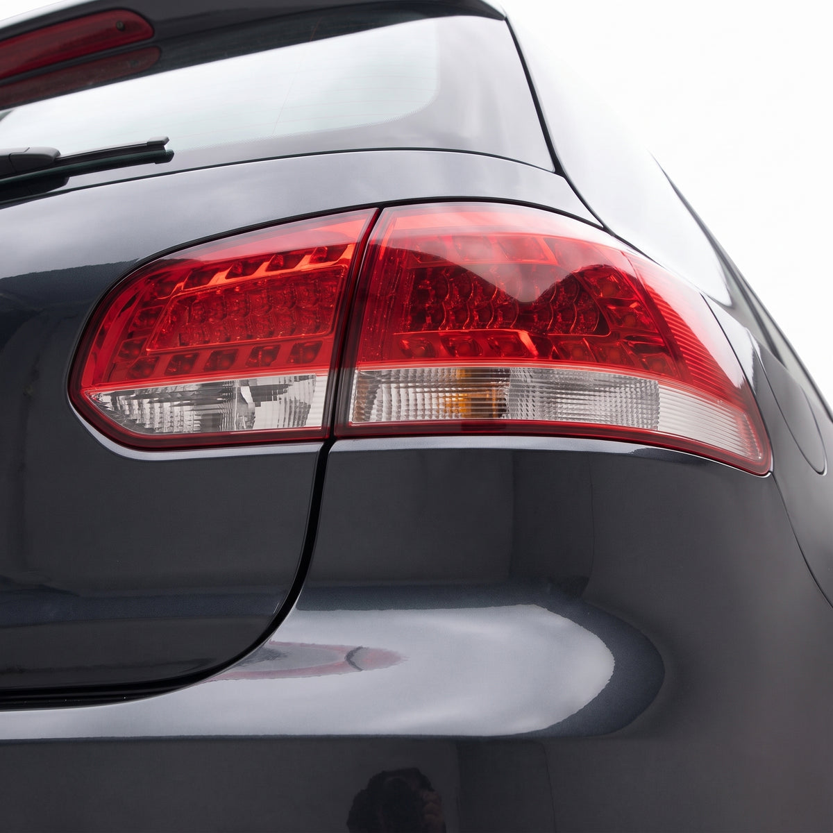 Volkswagen Golf MK6 (2009 - 2013) Classic Clear Red LED Tail Lights LH + RH installed close-up