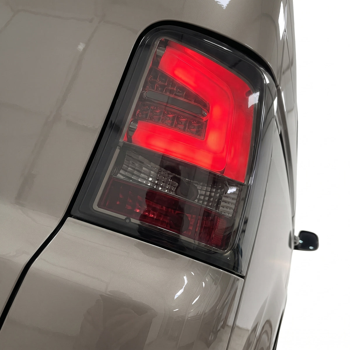 Volkswagen Multivan T5 (2010 - 2015) Smoked Black LED Tail Lights LH + RH installed close-up