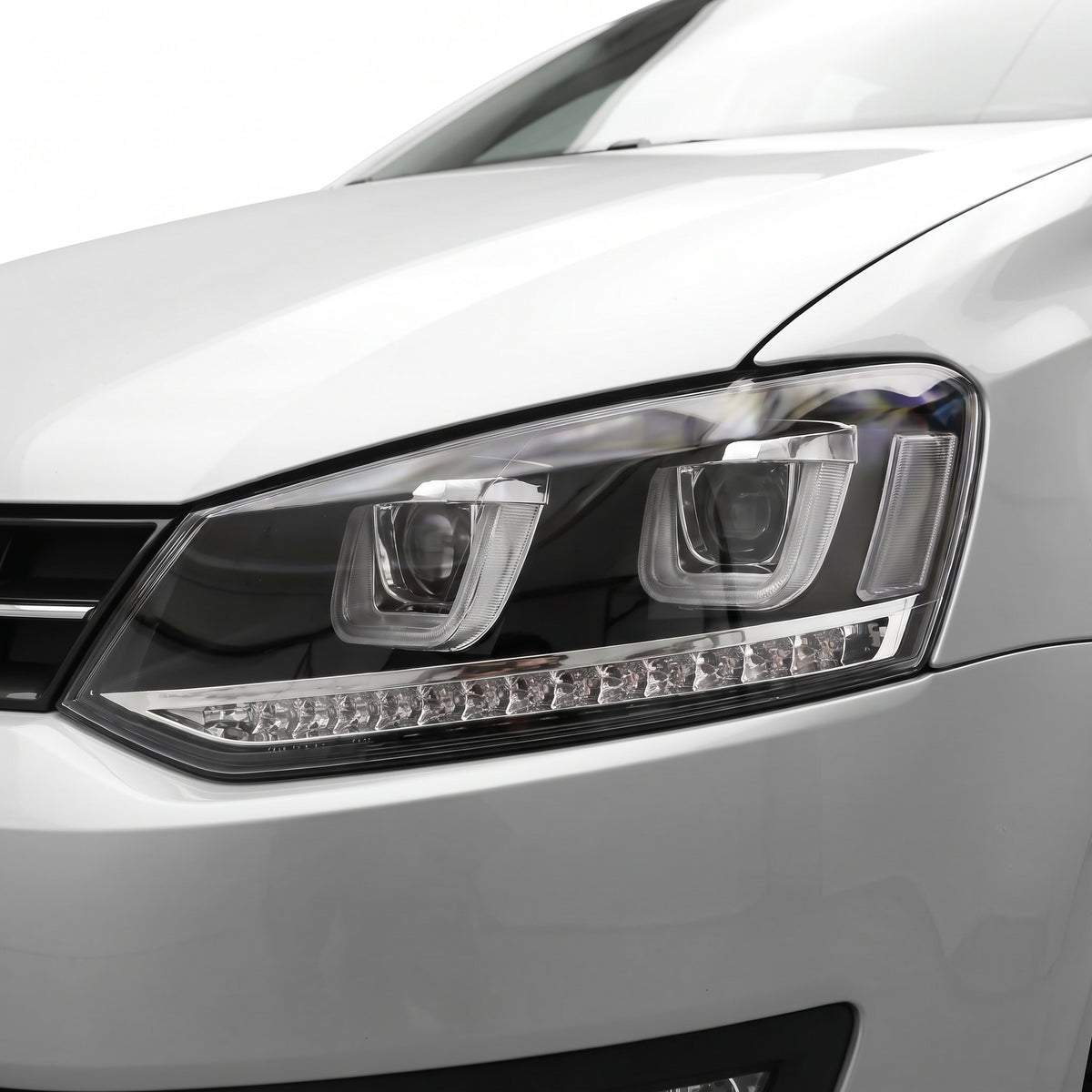 Volkswagen Polo 6R (2010 - 2016) R Style LED DRL Projector Head Lights with Sequential Indicators LH + RH installed close-up